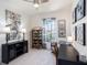 Bright office space with sleek black cabinets, white walls, and coordinated decor for a clean, modern look at 10450 Highland Park Pl, Palmetto, FL 34221