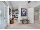 Well-lit bonus room featuring sports memorabilia and an arcade console at 1134 Starfish Ln, Tarpon Springs, FL 34689