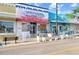 Charming exterior of 'Taste of Greece' cafe, featuring colorful awnings and Greek-inspired decor on a sunny day at 1134 Starfish Ln, Tarpon Springs, FL 34689