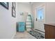 Charming entryway with unique decor, including a decorative boat shelf and a retro-style mini-fridge at 1134 Starfish Ln, Tarpon Springs, FL 34689