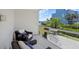 Relaxing patio with comfortable seating and serene canal view, perfect for outdoor living at 1134 Starfish Ln, Tarpon Springs, FL 34689