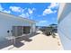 Spacious rooftop deck with ample seating and lounge chairs, perfect for outdoor entertaining and relaxation at 1134 Starfish Ln, Tarpon Springs, FL 34689