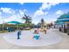 An interactive splash pad with marine-themed elements, providing a delightful and engaging water play experience at 1134 Starfish Ln, Tarpon Springs, FL 34689