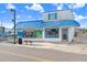 Storefront exterior featuring unique signage, displays of local goods, and a vibrant atmosphere on a sunny day at 1134 Starfish Ln, Tarpon Springs, FL 34689
