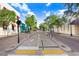 Street view with quaint shops, pedestrian crosswalks, and lush greenery, creating a welcoming and scenic atmosphere at 1134 Starfish Ln, Tarpon Springs, FL 34689