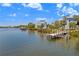 Waterfront property with dock and serene water view, perfect for boating enthusiasts at 1134 Starfish Ln, Tarpon Springs, FL 34689