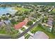 Charming neighborhood featuring manicured lawns and tree-lined streets with houses with lush landscaping at 11752 Wayside Willow Ct, Hudson, FL 34667
