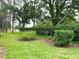 Exterior image showing a garden with shrubs at 11752 Wayside Willow Ct, Hudson, FL 34667