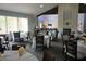 Community dining room with views from large windows at 11752 Wayside Willow Ct, Hudson, FL 34667