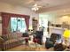 Comfortable living room area featuring open sight lines and an outside view at 11752 Wayside Willow Ct, Hudson, FL 34667