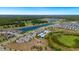 A beautiful community with a pool, playground, and a picturesque lake surrounded by lush greenery at 12908 Hawkstone Trail Blvd, Lithia, FL 33547