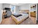 Bedroom featuring a comfortable bed, workspace, and natural light from the window at 12908 Hawkstone Trail Blvd, Lithia, FL 33547