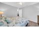 Well-lit bedroom featuring a comfortable bed and stylish decor creating a cozy atmosphere at 12908 Hawkstone Trail Blvd, Lithia, FL 33547