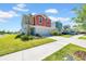 Street view of modern homes with well-manicured lawns, driveways, and landscaping at 12908 Hawkstone Trail Blvd, Lithia, FL 33547