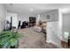 Upstairs living area with plush carpet, comfortable seating, and natural light from a window view at 12908 Hawkstone Trail Blvd, Lithia, FL 33547