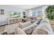 Comfortable living space with modern decor, plush seating, and abundant natural light at 12908 Hawkstone Trail Blvd, Lithia, FL 33547