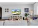 Elegant living room with stylish furniture, modern decor, and abundant natural light at 12908 Hawkstone Trail Blvd, Lithia, FL 33547