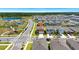 Street view of a new construction two-story home near community playground and other homes at 12908 Hawkstone Trail Blvd, Lithia, FL 33547