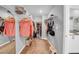 Walk-in closet with ample shelving and storage space for clothing, shoes, and accessories at 12908 Hawkstone Trail Blvd, Lithia, FL 33547