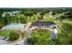 Aerial view of The Eagles showing clubhouse, golf course, and surrounding natural beauty at 12918 Royal George Ave, Odessa, FL 33556
