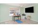 Versatile room with plenty of light and laminate floors would make a great den or office at 1305 Greenfield Cir, Venice, FL 34292
