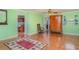 Bonus room featuring laminate flooring, natural light, and versatile space for entertainment at 1305 Greenfield Cir, Venice, FL 34292