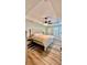 Comfortable bedroom with a ceiling fan and carpet at 13486 English Sparrow Rd, Weeki Wachee, FL 34614