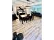 Open concept floor plan showcases kitchen, dining area, and living room at 13486 English Sparrow Rd, Weeki Wachee, FL 34614