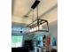 Modern dining room lighting fixture at 13486 English Sparrow Rd, Weeki Wachee, FL 34614