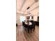 Dining area with modern lighting and hardwood flooring throughout at 13486 English Sparrow Rd, Weeki Wachee, FL 34614