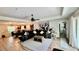 Spacious living room featuring modern decor, an open floor plan, and stylish furnishings at 13486 English Sparrow Rd, Weeki Wachee, FL 34614