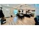 Inviting eat-in kitchen with dark cabinets, granite counters, and stainless appliances at 13486 English Sparrow Rd, Weeki Wachee, FL 34614