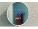 Close-up of a modern digital thermostat showing the indoor temperature at 13486 English Sparrow Rd, Weeki Wachee, FL 34614