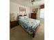 Comfortable bedroom featuring a full size bed and furnishings at 1695 Stable Trl, Palm Harbor, FL 34685