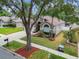 Well-manicured front yard and attractive home exterior, showcasing curb appeal at 2719 Brookville Dr, Valrico, FL 33596