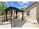 Outdoor gazebo on wooden deck with privacy curtains; great for entertaining or enjoying time outdoors at 2719 Brookville Dr, Valrico, FL 33596
