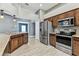 Well-equipped kitchen boasts stainless steel appliances, ample counter space, and modern finishes at 2719 Brookville Dr, Valrico, FL 33596