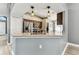Kitchen featuring stainless steel appliances and bar-style seating at 2719 Brookville Dr, Valrico, FL 33596