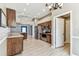 Open-concept kitchen with stainless steel appliances and granite countertops at 2719 Brookville Dr, Valrico, FL 33596