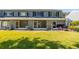 Screened-in patios and backyard space in this townhome offer outdoor living and entertaining opportunities at 309 Countryside Key Blvd, Oldsmar, FL 34677