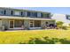 Screened-in patios and backyard space in this townhome offer outdoor living and entertaining opportunities at 309 Countryside Key Blvd, Oldsmar, FL 34677