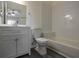 Updated bathroom with subway tile surround and modern vanity at 309 Countryside Key Blvd, Oldsmar, FL 34677
