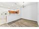 View of kitchen and dining area showing appliances and cabinetry at 31434 Shaker Cir, Wesley Chapel, FL 33543
