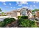 Charming single-story home with a two-car garage, landscaped yard, and a stucco exterior at 31434 Shaker Cir, Wesley Chapel, FL 33543