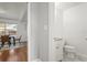 Half bath featuring a white vanity, toilet, and stylish tile flooring at 3600 46Th N St, St Petersburg, FL 33713