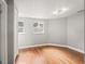 Well-lit bedroom with wood floors and clean white trim at 3600 46Th N St, St Petersburg, FL 33713