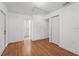 This spacious bedroom features wood-look floors, closet, and ensuite bath at 3600 46Th N St, St Petersburg, FL 33713