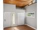 Bedroom featuring vaulted wood ceilings, natural light, and closet at 3600 46Th N St, St Petersburg, FL 33713