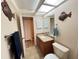 Relaxing bathroom featuring granite countertop, and tile flooring at 3907 Applegate Cir, Brandon, FL 33511
