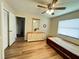 Bedroom with a twin bed, wood-look flooring, dresser, and closet at 3907 Applegate Cir, Brandon, FL 33511